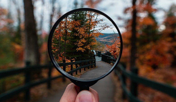 Magnifying lens, representing zooming into to specific aspects of your life and the polycrisis