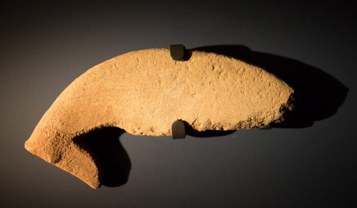 A stone sculpture of a dog that resembles the ancient native Saluki breed, for article on Al-Magar civilization