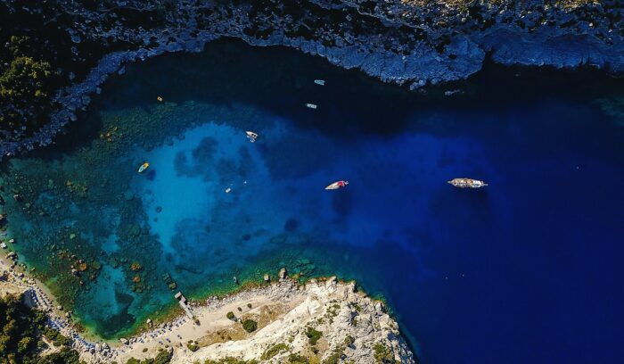 Aerial view of Barbadian cove with boats