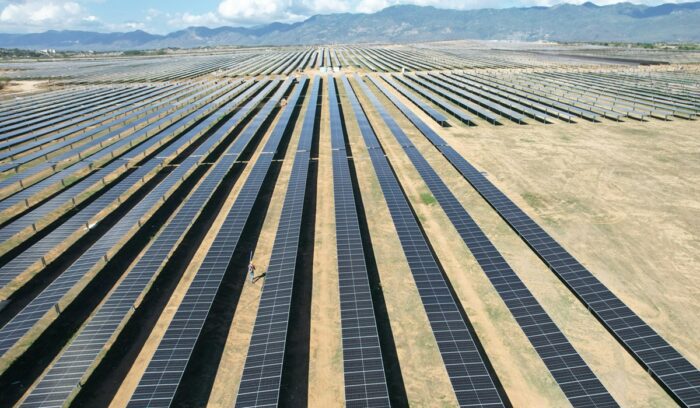 Aerial view of large solar farm, for article on Gulf solar projects
