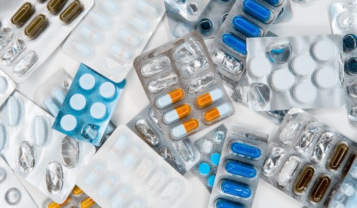 Assorted medicine and pills in packages|haley lawrence unsplash