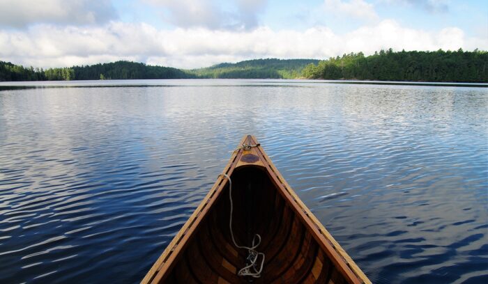 Canoe on a lake, for article on dugout canoe