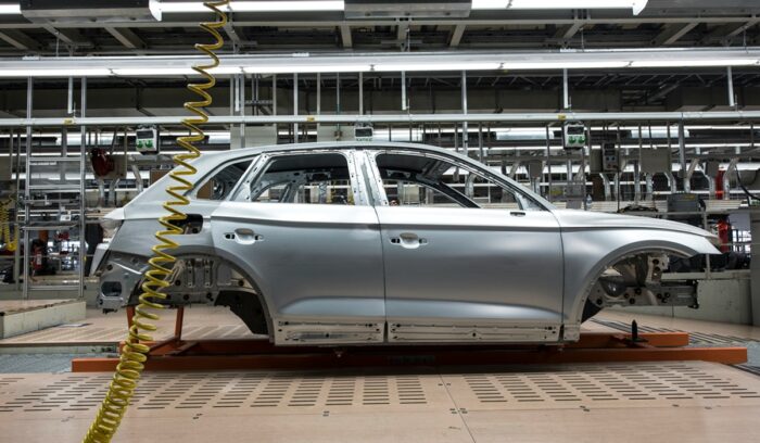 Car being assembled in factory