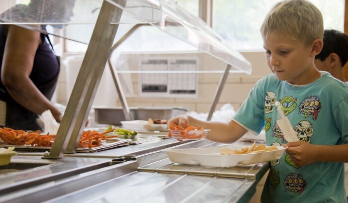 Child getting school lunch