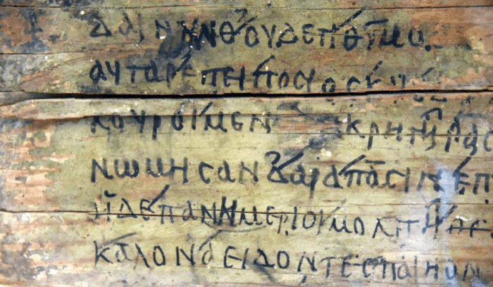 Detail. Wooden board (writing tablet) inscribed (Greek) in ink with lines 468-473, for article on Homer's Iliad and Odyssey