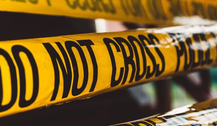 "Do not cross police barricade" tape, for article on U.S. homicide decline