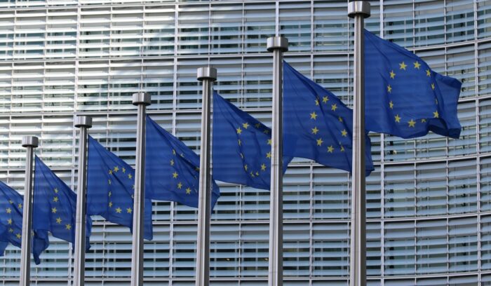 EU flags representing international oversight amid U.K. mass surveillance concerns
