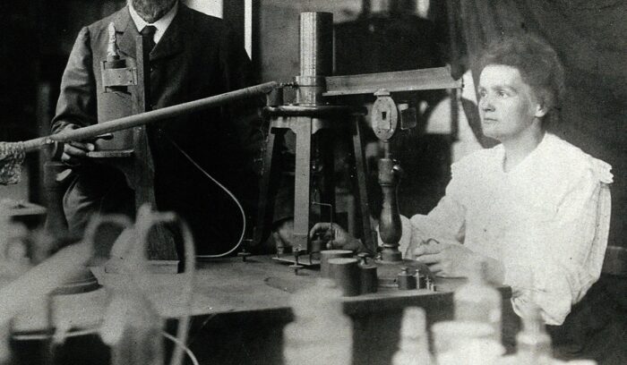 Marie Curie in the laboratory, for article on radioactivity research