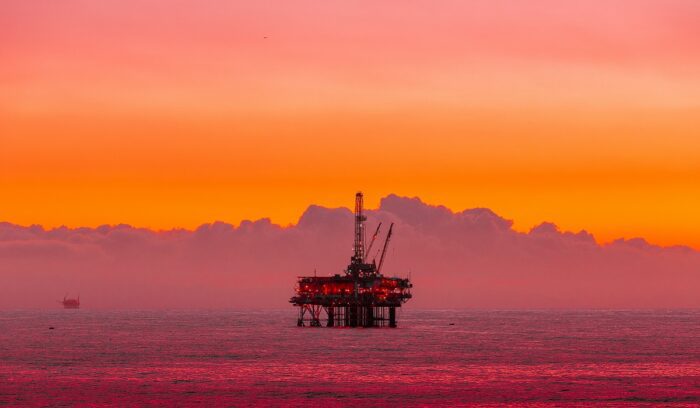 Offshore oil rig at sea representing debates around an offshore drilling ban
