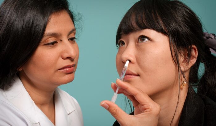 Person receiving nasal spray