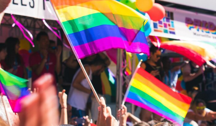 Rainbow flags outside a courthouse in Manila for an article about same-sex property rights Philippines