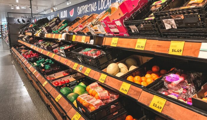 Produce aisle at grocery store, for article on California plastic bag ban