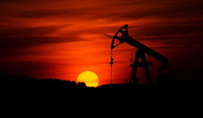 Pump-jack mining crude oil at sunset, for article on federal oil and gas leases
