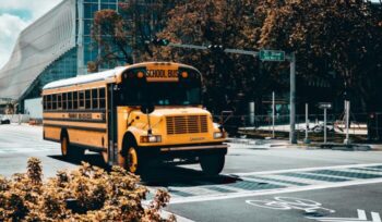 School bus on the road, for article on electric school bus mandate
