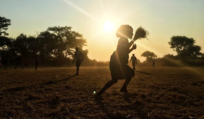 Silhouettes of people in Zambia, for article on Tonga settlement Zambezi