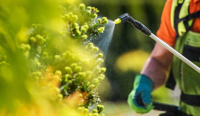 Spraying pesticides|Roundup