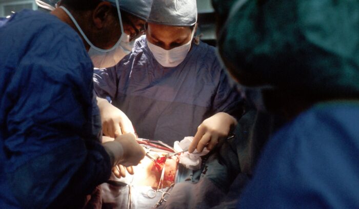 Surgeons operating