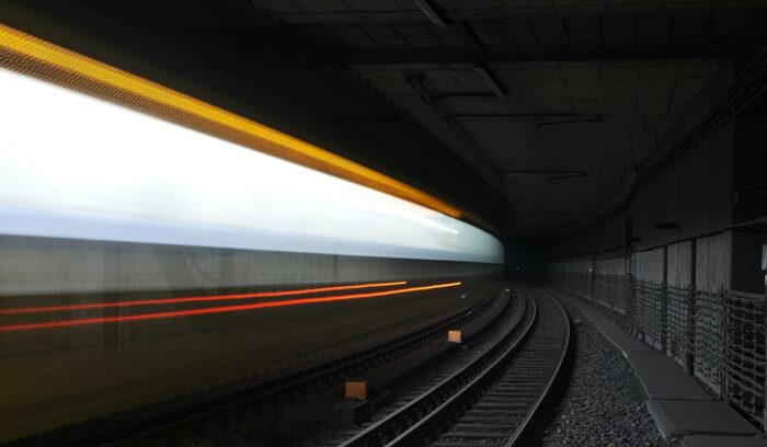 A modern passenger train on a rural track at dusk for an article about hydrogen passenger train