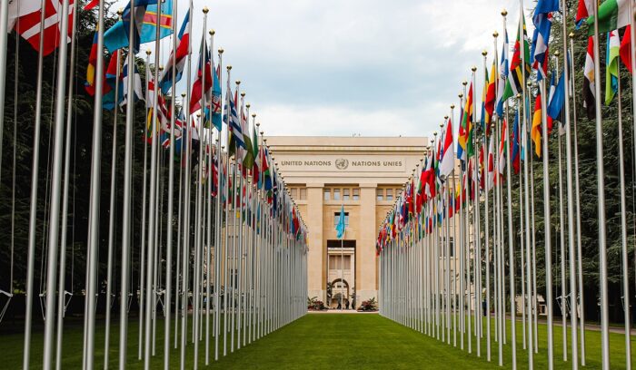 World leaders signing an international agreement for an article about fossil fuel non-proliferation treaty