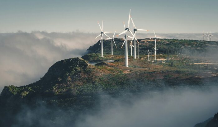 Wind turbines amid clouds, for article on E.U. wind power, for article on renewable electricity generation