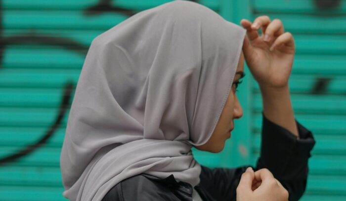 Woman wearing head covering, for article on gender-based violence