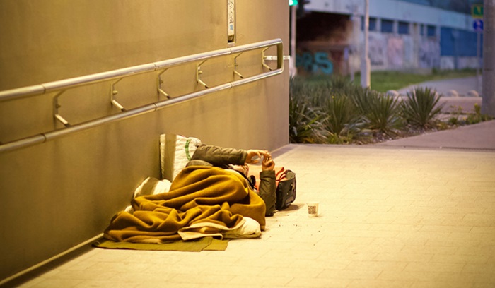 Homeless person laying down