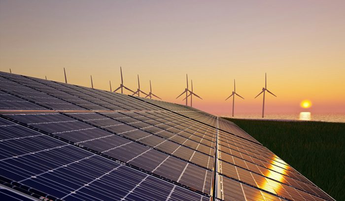Solar panels installed in a vast field in India for an article about India non-fossil power capacity