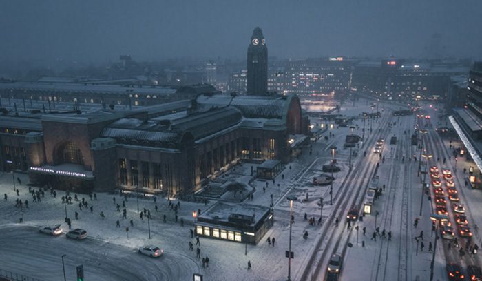 A quiet Helsinki street with a bike lane and pedestrian crosswalk for an article about zero traffic deaths