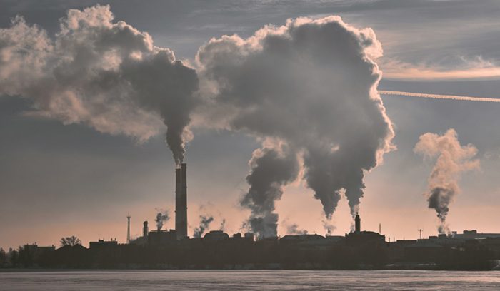 Smoke stacks at a retired coal power plant for an article about coal-free New England