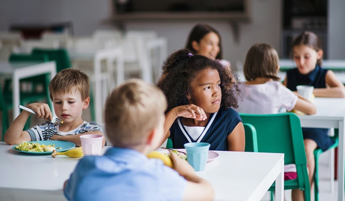 Children eating school meal