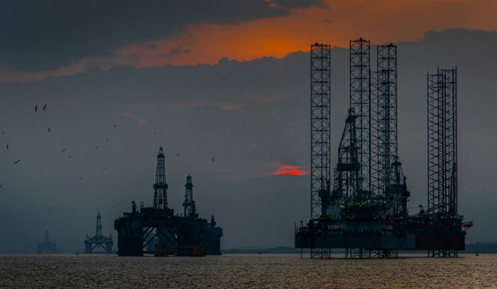 Offshore oil platform at sunset in the North Sea for an article about the UK oil and gas ban