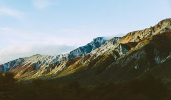 Mountain landscape with blue sky in background