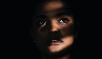 Woman's face in the shadows