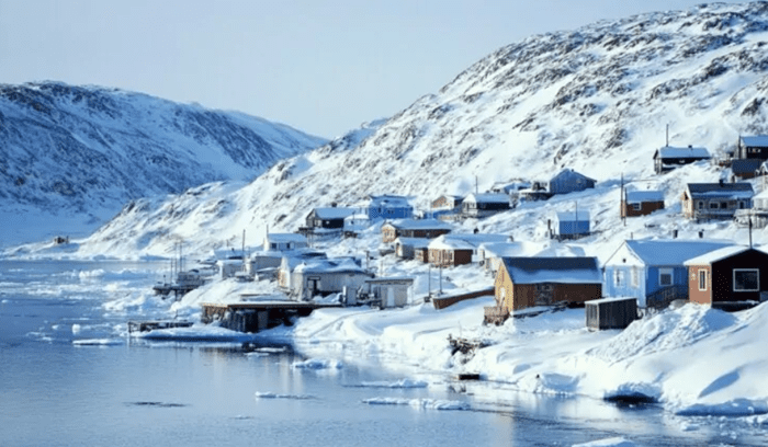 Aerial view of Arctic tundra and frozen coastline for an article about Inuit-led university funding in Canada