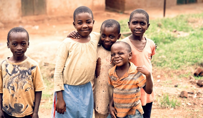African children smiling, for article on measles vaccination Africa