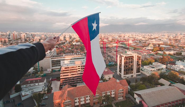 Someone holding a Chilean flag, for article on leprosy elimination