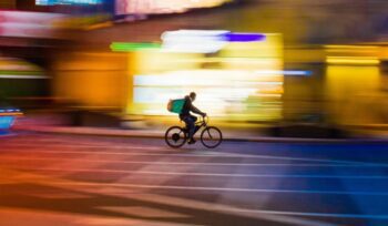 Bike delivery person, for article on gig worker convention