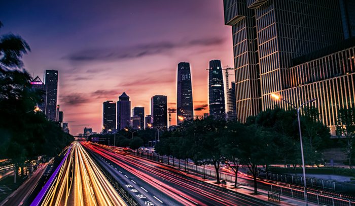 Beijing traffic lights at dusk, for article on EV health impact